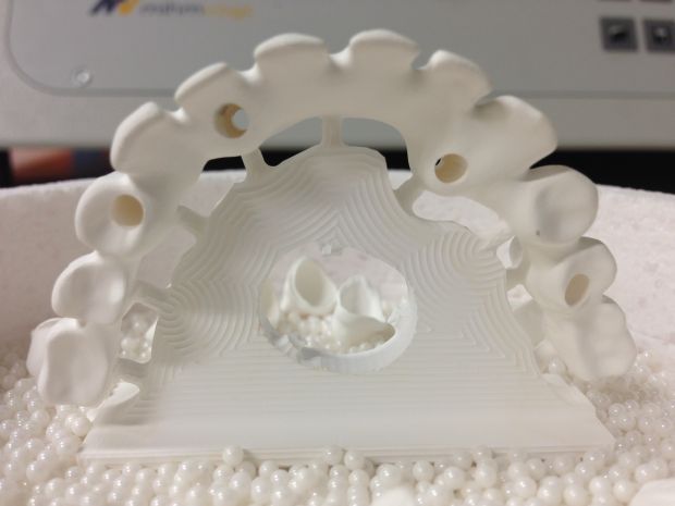 CAD/CAM zirconium frames, embedded in pearl powder before sintering-5